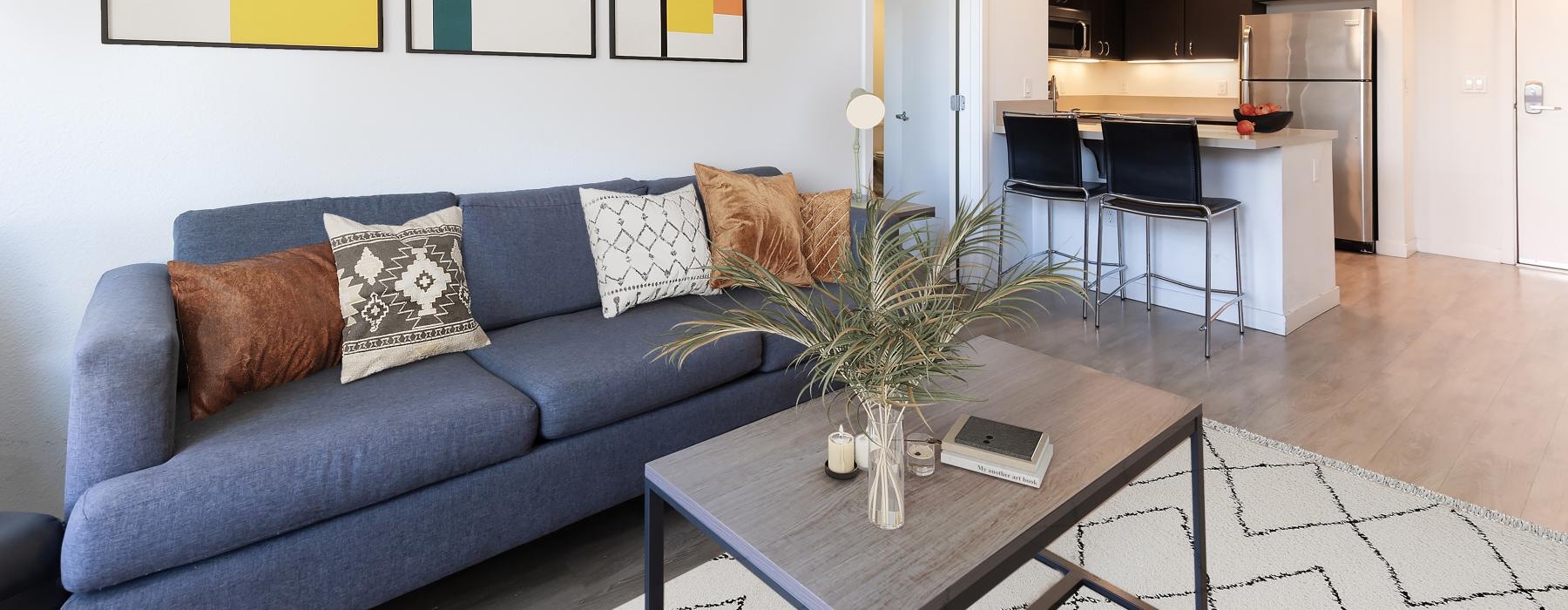 a living room with a couch and a table