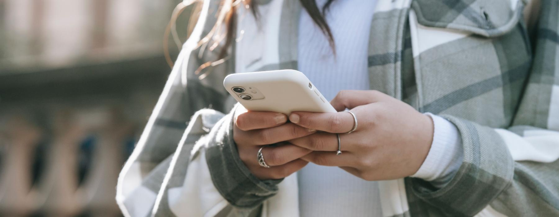 woman holding a phone