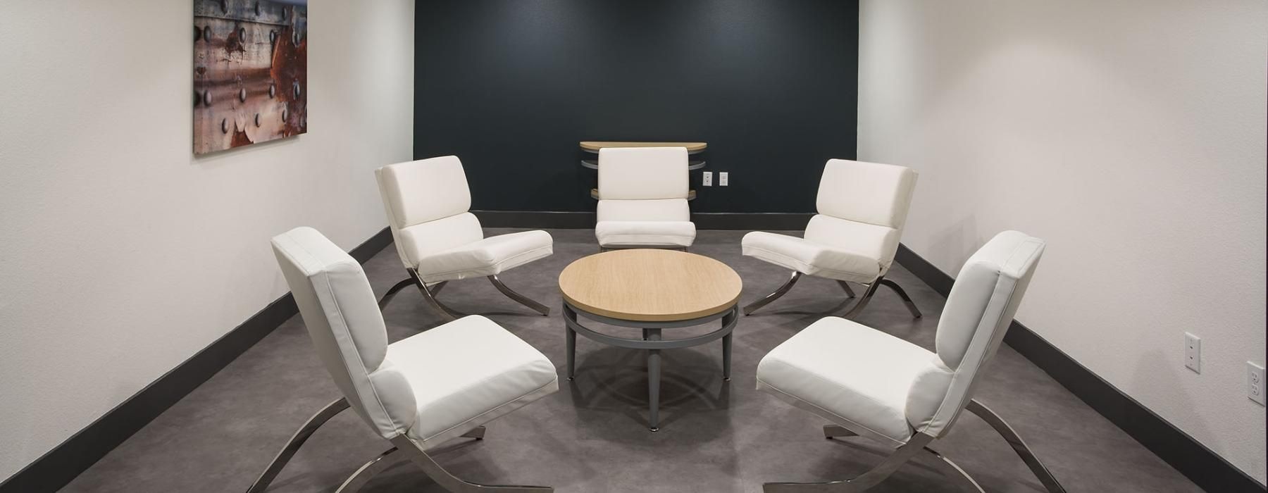 meeting room with a table and chairs