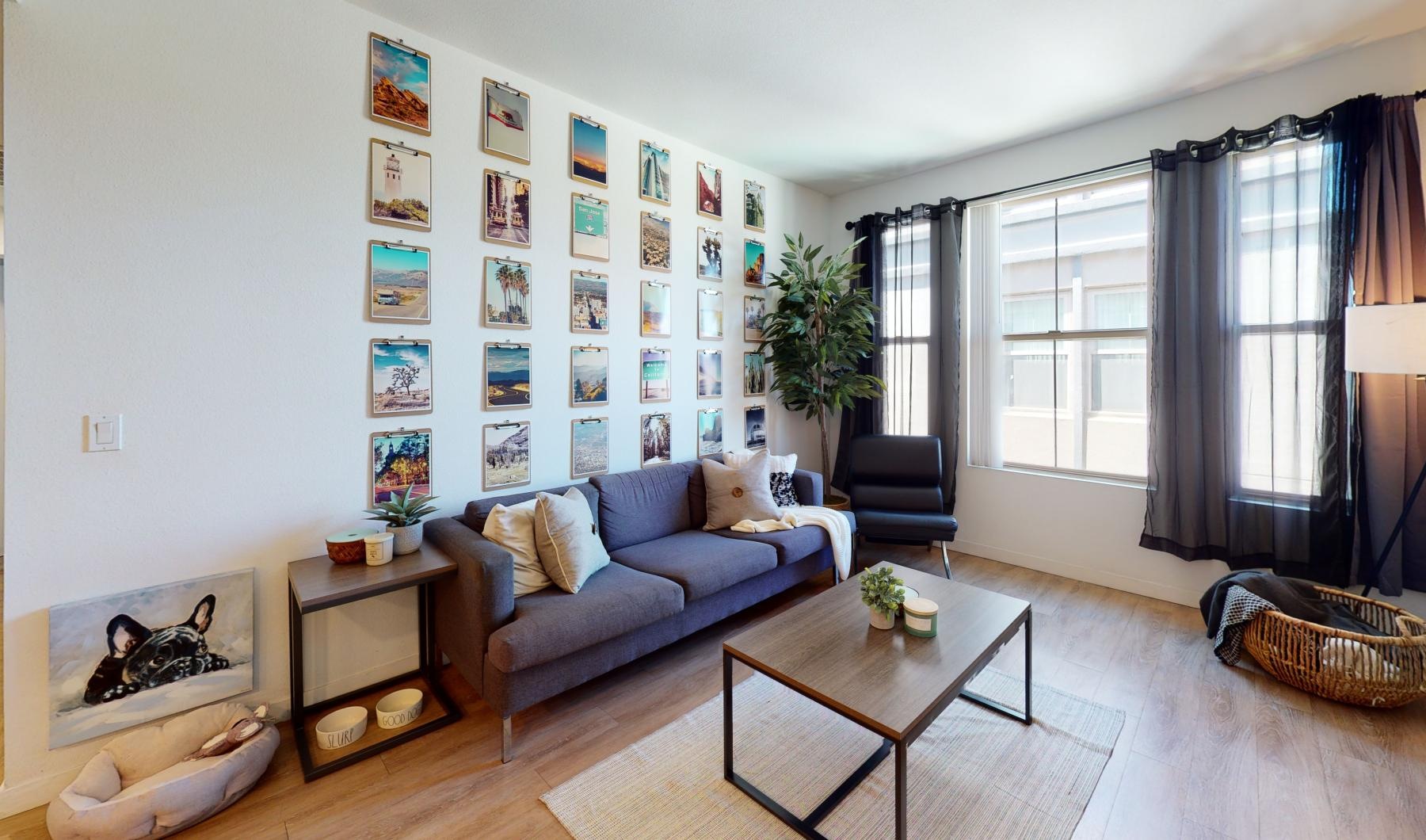 a living room with a couch and a table