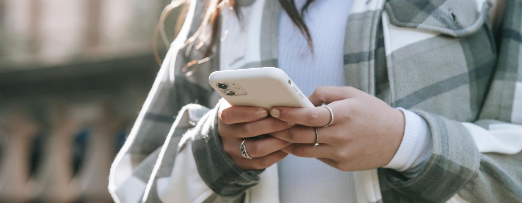 woman holding a phone